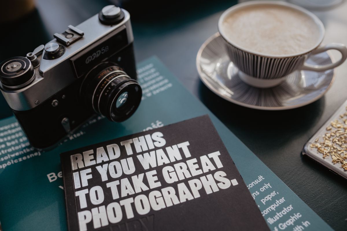 old books and camera